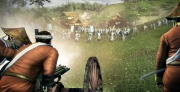 Total War: SHOGUN 2 - Fall of the Samurai - A Gatling Gun opens fire on a charging unit of traditional Samurai warriors.