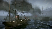 Total War: SHOGUN 2 - Fall of the Samurai - Naval battle. In the foreground is a metal-plated Frigate-class ship.