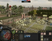 Company of Heroes: Opposing Fronts - Company of Heroes: Opposing Fronts - 8 Spieler Karte - Blood Red River - Der Friedhof mit der Stadt dahinter.