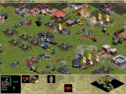 Age of Empires: Der blaue Gegner scheint den roten Gegner zu vernichten, wenn dieser nicht noch woanders ein Lager hat.